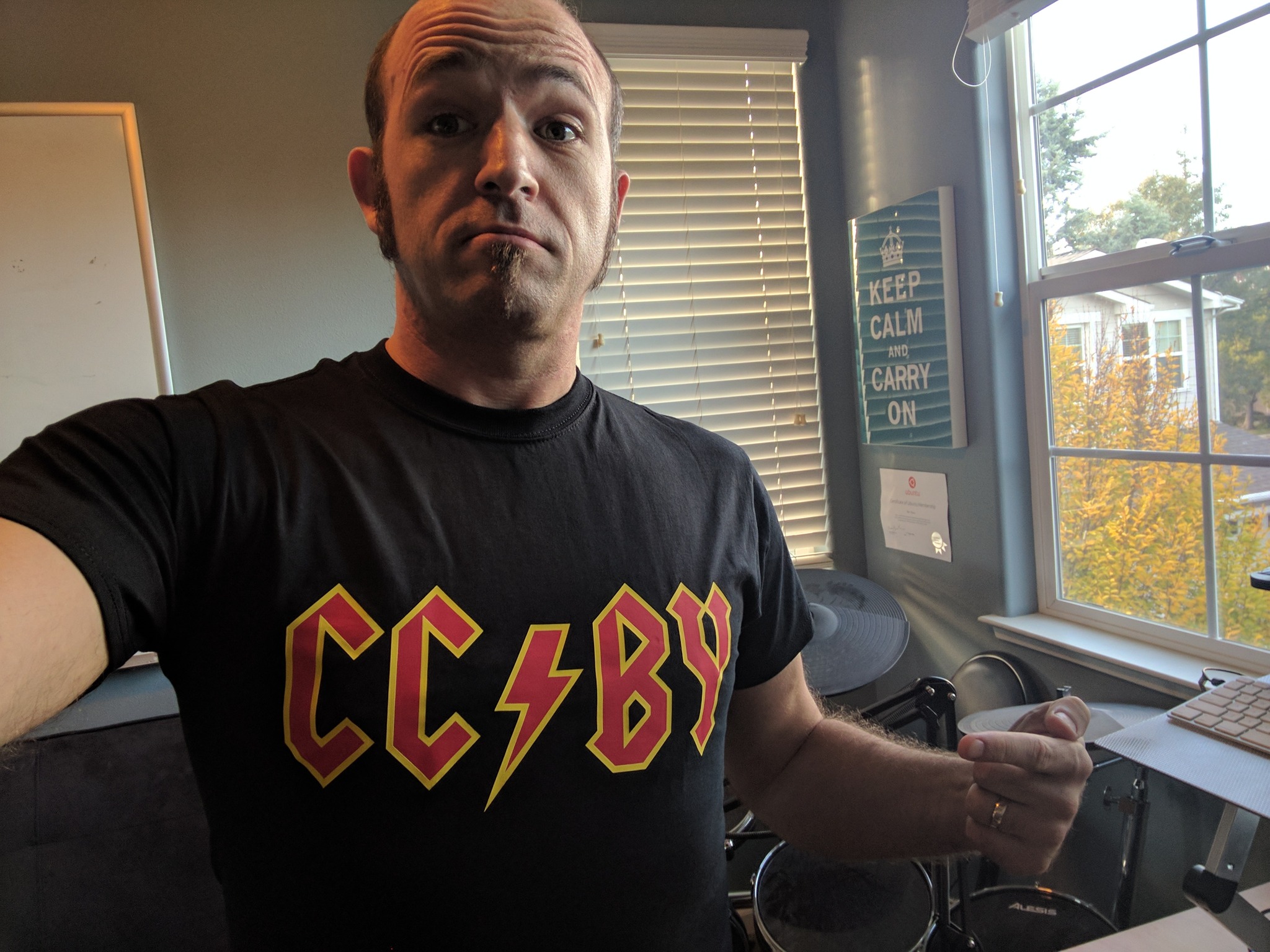 Developer engagement example: Jono Bacon wearing his favorite piece of swag from Creative Commons, demonstrating quality, meaningful merchandise versus promotional giveaways